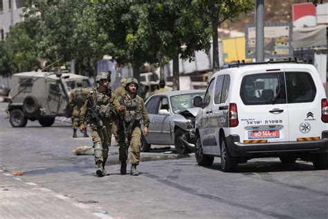 Palestinian driver rams truck into pedestrians at West Bank checkpoint, wounding 3